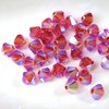 50 Stück Swarovski® Kristalle 5328 Xilion Beads 4mm, Indian Pink AB2x *289AB2