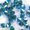 50 Stück Swarovski® Kristalle 5328 Xilion Beads, 4mm Emerald AB2x *205AB2