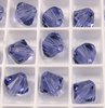 4 Stück Swarovski® Kristalle 5328 Xilion Beads, 8mm, Tanzanite *539