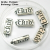 10 Stück Metallanhänger, CHIQ, ca. 15x6 mm, Ösengröße 1,5mm, versilbert