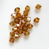 50 Stück Swarovski® Kristalle 5328 Xilion Beads 2,5mm, Crystal Copper *001COP