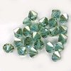20 Stück Swarovski® Kristalle 5328 Xilion Beads, 6mm, Aquamarine Golden Shadow *202GSHA