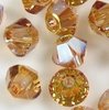 50 Stück Swarovski® Kristalle 5328 Xilion Beads, 4mm, Crystal Metallic Sunshine *001METSH